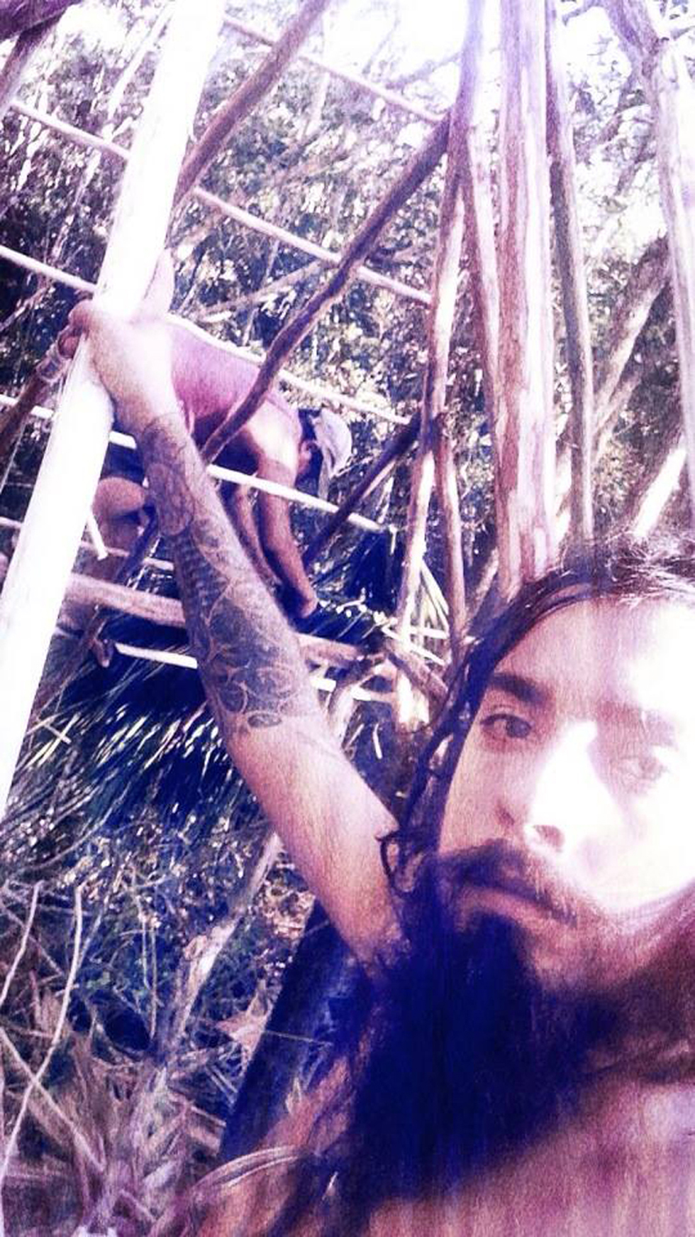 Founder of the Lemurian Embassy, Guillermo Alarcón climbing on location in the jungle