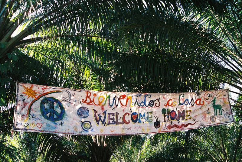 The Welcome Home sign at the entrance of the Rainbow Gathering.