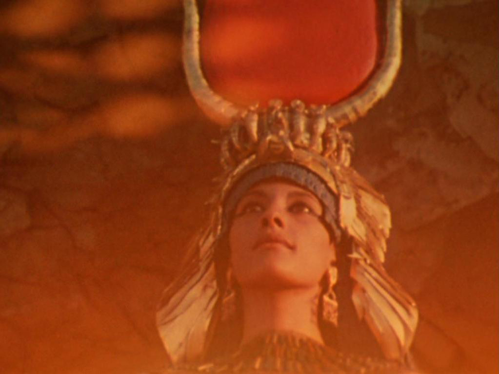 Isis (Egyptian Goddess of Magic and Life, portrayed by Myriam Gibril ). A still from Lucifer Rising (1966-1980), a film by Kenneth Anger. Colour, 16mm, 28mins.