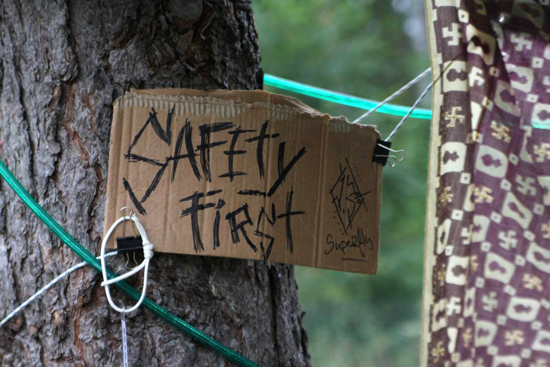 A sign on a tree by Superfly Suspension Crew at the 2014 annual Superfly Summer Camp. Photo Martin Villiam Jensen.