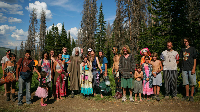 People of the Rainbow at the USA Rainbow Gathering in the Uinta Forest, Utah. Photo Tyler Coleman.