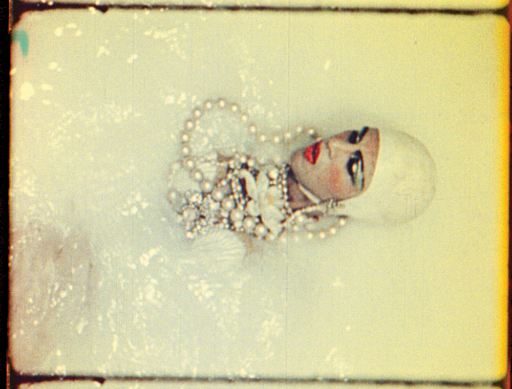 An exotic bath. A still from Normal Love (1963) A film by JACK SMITH. Colour, Sound, 16mm, 103 mins.