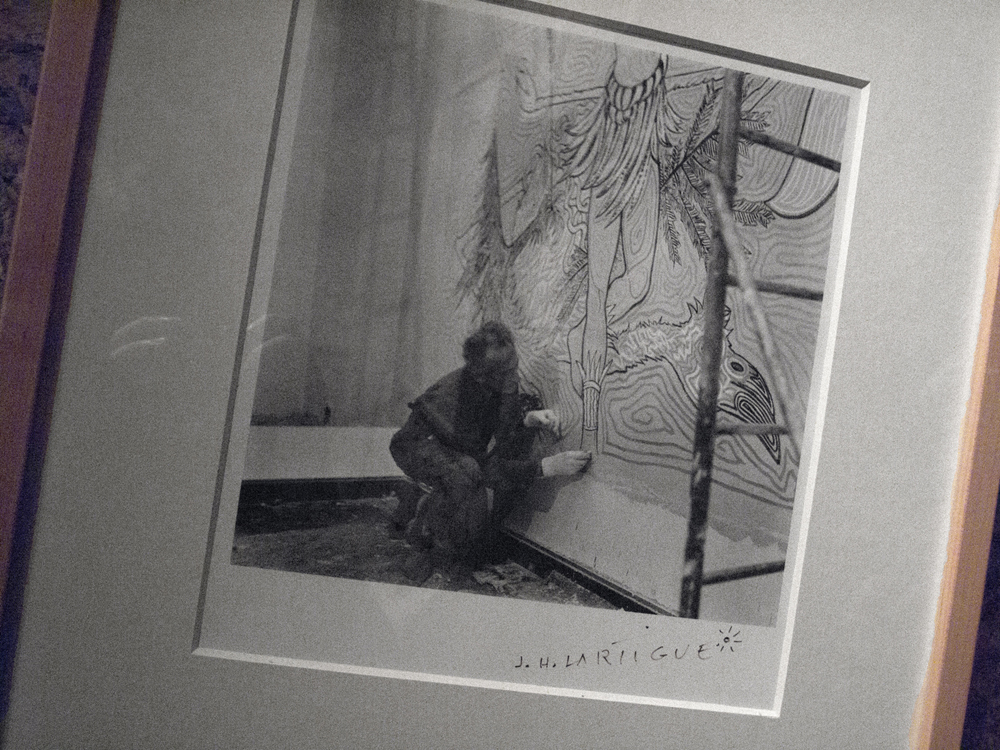 Jean Cocteau at work. A photograph by Jacques Henri Lartigue.