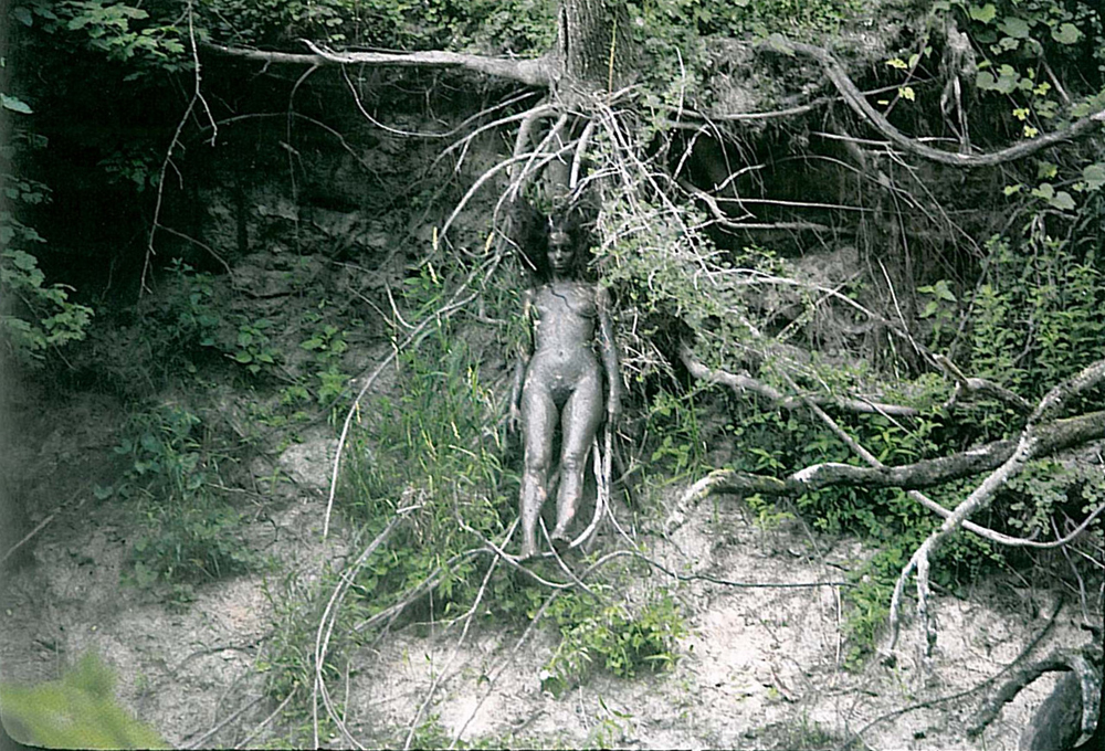 Arbol de la Vida (Tree of Life) (1976–9) by Ana Mendieta. Photographed at Old Man's Creek, Iowa City, Iowa. Colour Photograph, lifetime print.