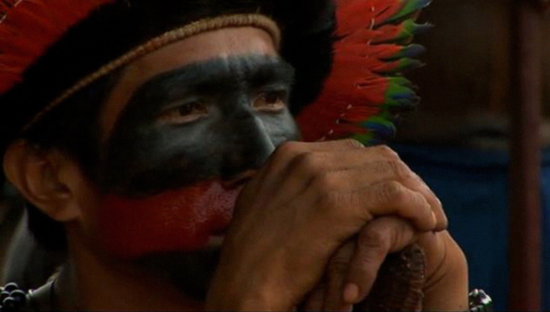 A Xingu tribe member in the Amazon rainforest of Brazil. A still from Belo Monte Justice Now! A film by Todd Southgate for Amazon Watch.