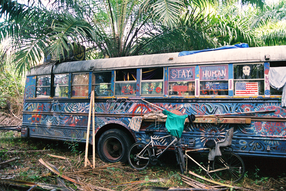 STAY HUMAN. Side view of the The Dream Machine from USA. All these photos were taken after the torrential rains of 21 December turned the jungle grounds into muddy swamps.