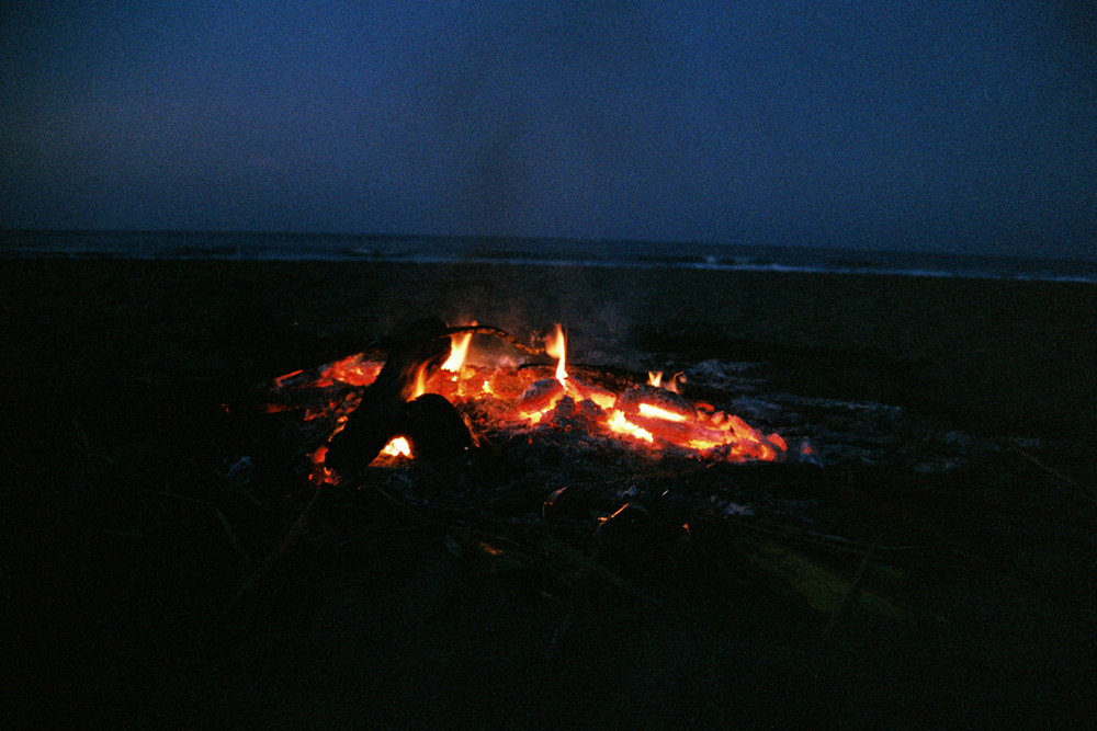 Our fire at night, we camped on the beach.