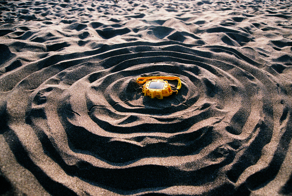 Little Sun charging during the day on the beach.