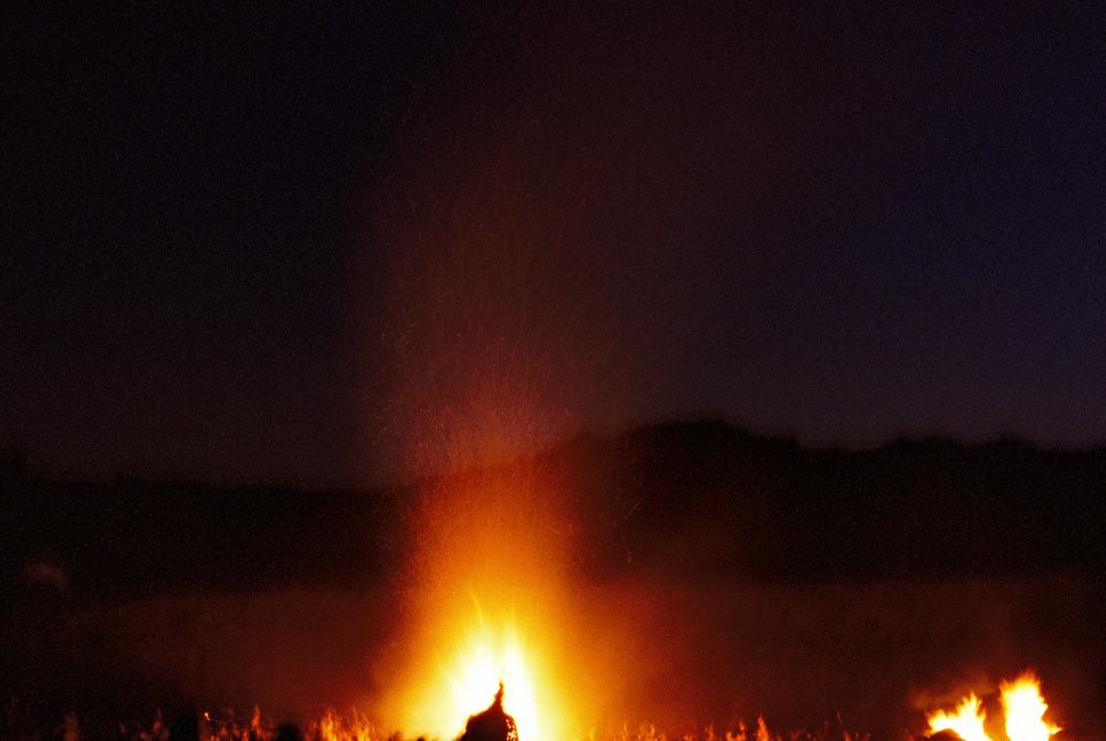 The sacred fire burning through the night.