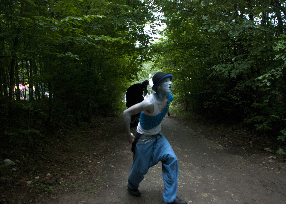 Clown meandering through one of the paths in the forest of Transylvania.