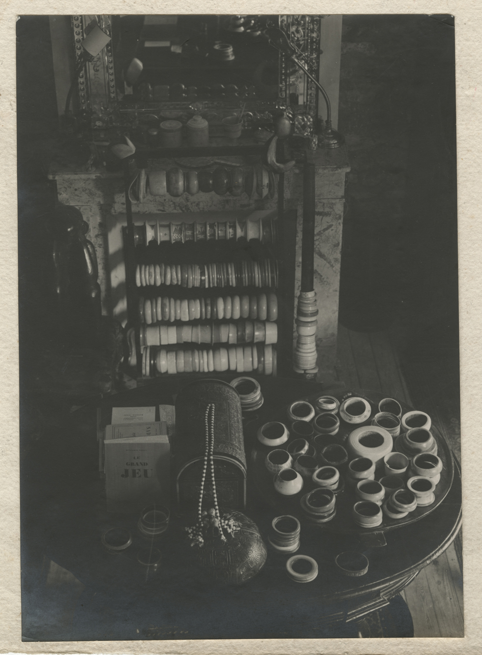 Nancy Cunard's ivory bracelets at the La Chapelle Réanville, c.1930. Photographed by Jacques-André Boiffard. © Rights reserved Centre Pompidou