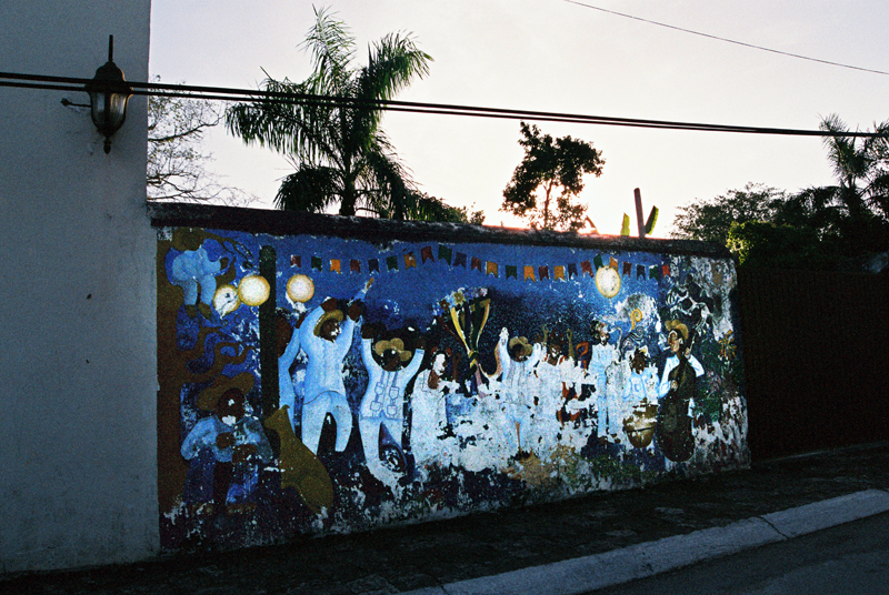 Fiesta on a mural for the sunset in Bacalar.