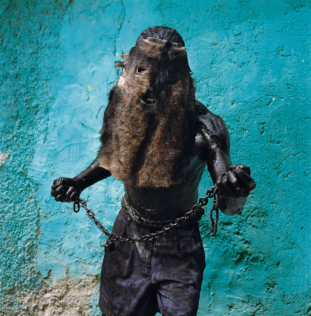 Man with Chain, Jacmel, Haiti, 2004.