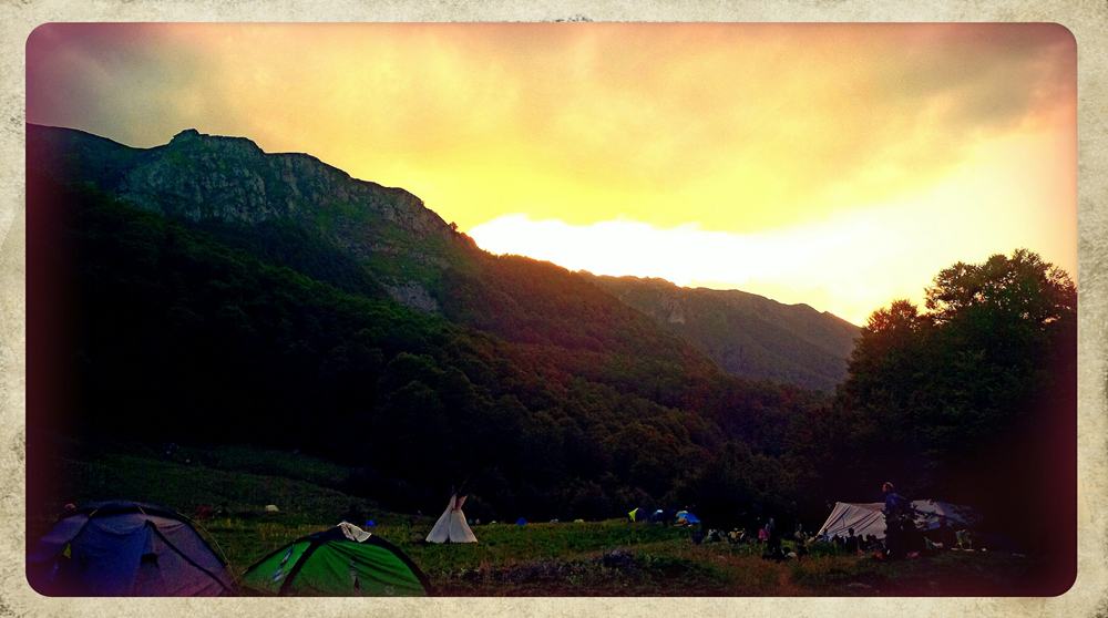 Late afternoon with the sun setting over the European Rainbow Gathering.