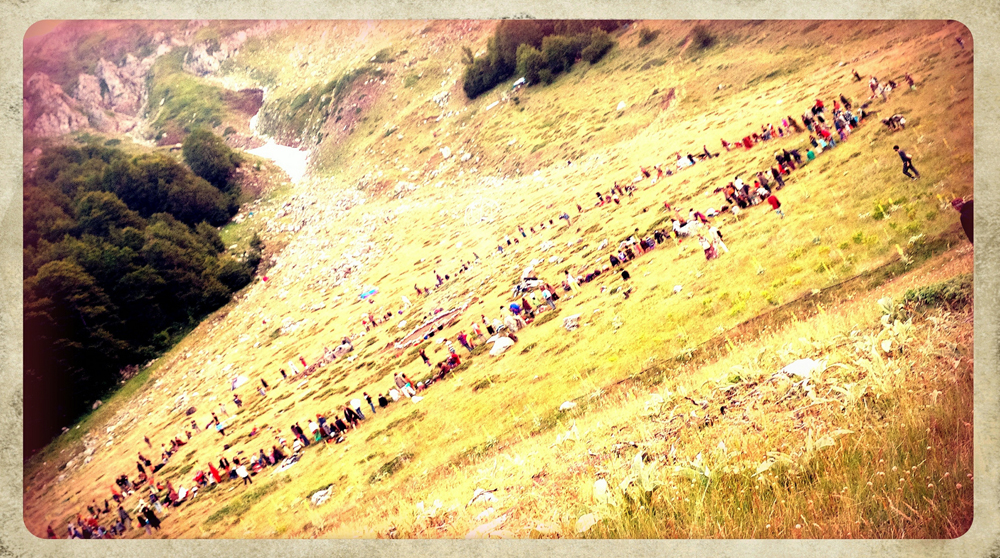 The main circle at the European Rainbow Gathering in the mountains of Greece...Gathering for dinner time!