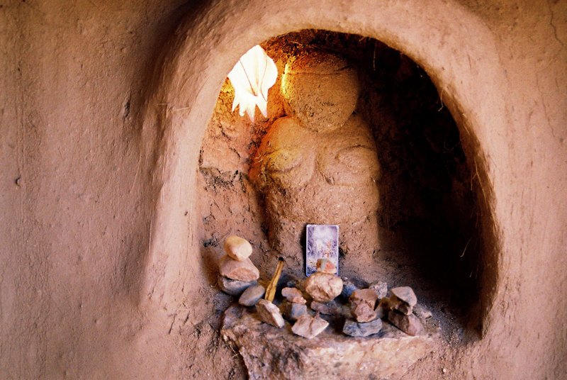 A clay altar around the Sacred Fire area.