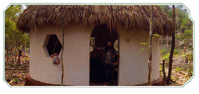 Guillermo Alarcon at the entrance of a palapa - Mayan style cabana