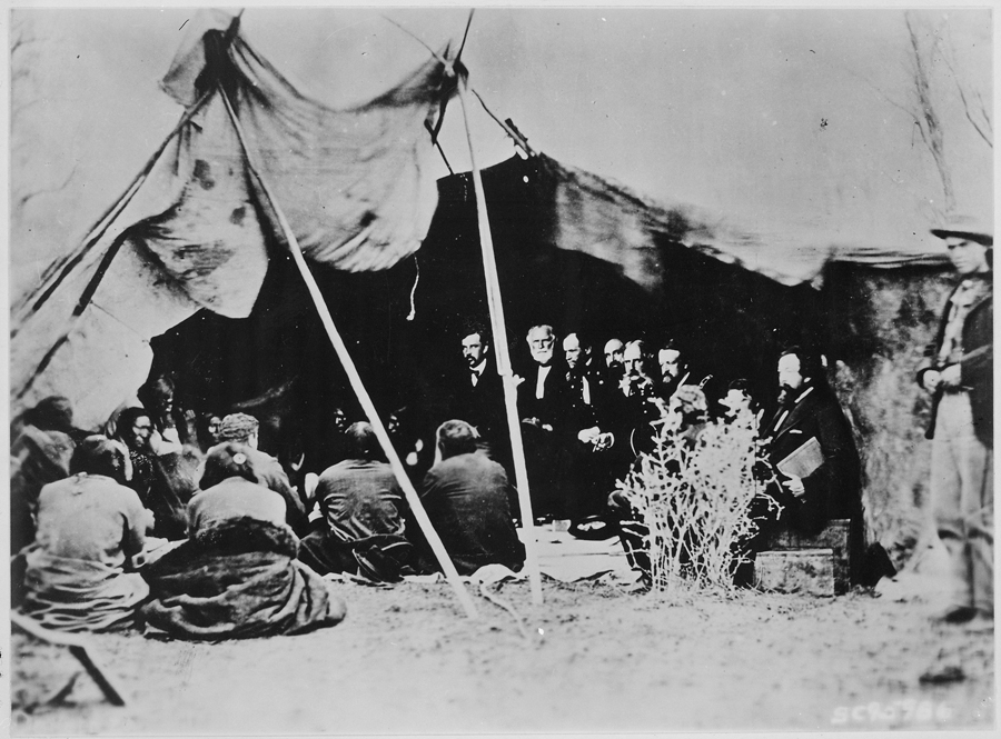 The Third Eye Magazine_Photograph_of_General_William_T._Sherman_and_Commissioners_in_Council_with_Indian_Chiefs_at_Fort_Laramie,_Wyoming,_ca._1_-_NARA_-