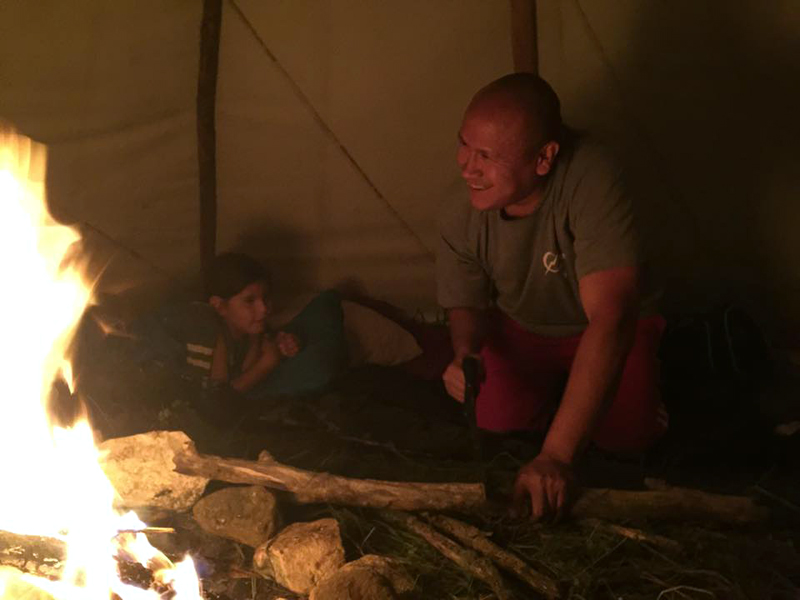 Inside a tipi at the Rainbow Gathering in the Black Hills, South Dakota. Photo Chase Iron Eyes