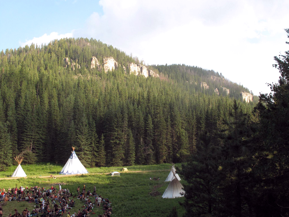 A view on the US Rainbow Gathering in the forested higlands of the Black Hills, South Dakota. 