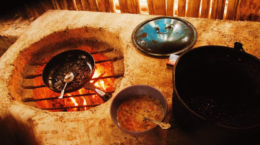 The primary method of cooking in Lemurian Embassy for 2 years its been straight up wood fire, camping style! Since the latest kitchen renovations, the kitchen stove has been designed to have 2 pots and a tortilla heat up pan, it's original design is a traditional Mayan style ( fogon ) which uses the exact method of a new age rocket stove. Excited to finally use it!! 